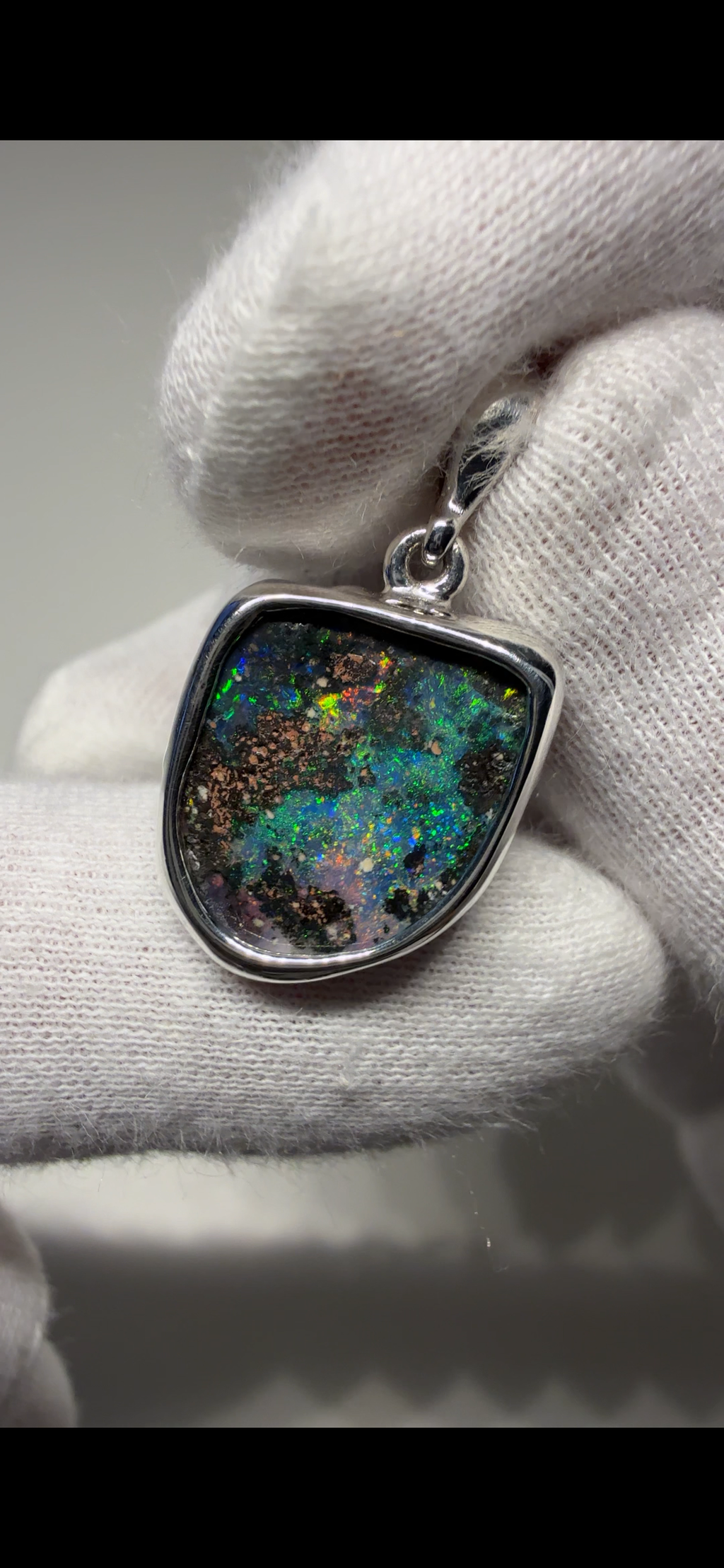 Insane value Boulder opal pendant B16